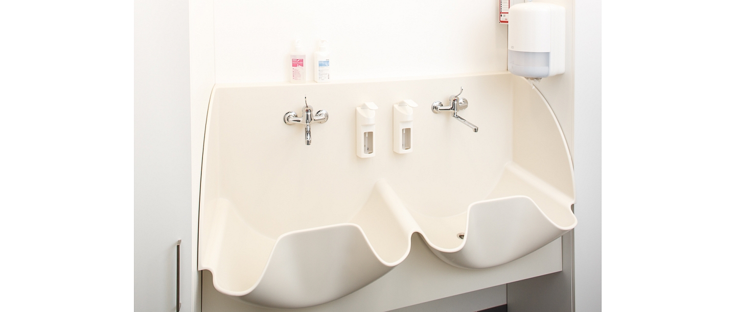 Surgical sinks made of artificial stone