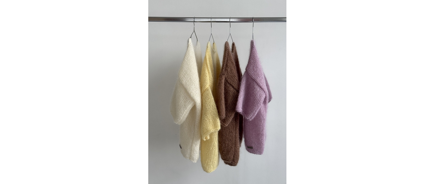 Collection of colorful sweaters, that attracts attention.