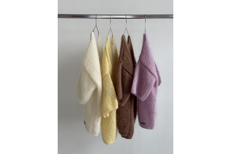 Collection of colorful sweaters, that attracts attention.