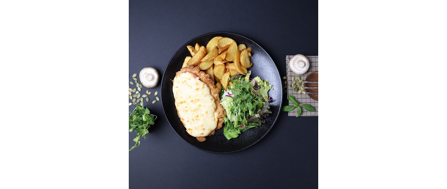 Pork in French style - hearty, juicy and full of flavor