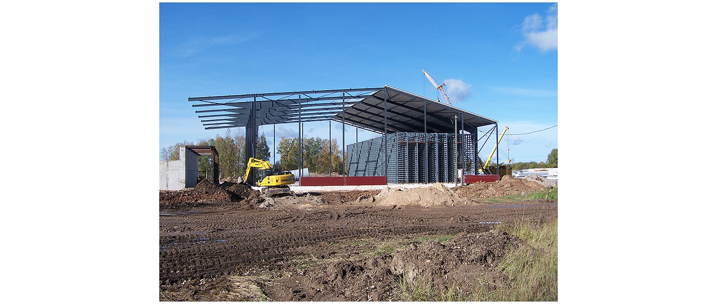 Structures for machinery and grain holdings