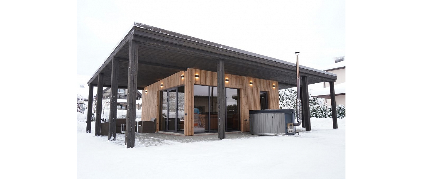 Sauna building with a canopy