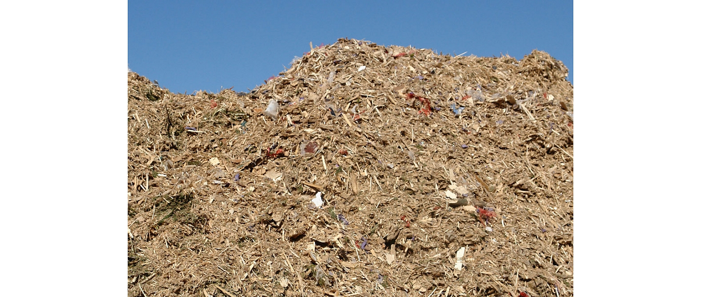 Processing of wood waste separated from construction debris