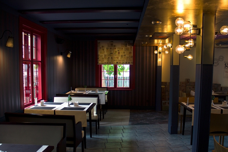 The interior of the Postman's House combines warm lighting and a peaceful atmosphere for a comfortable stay.