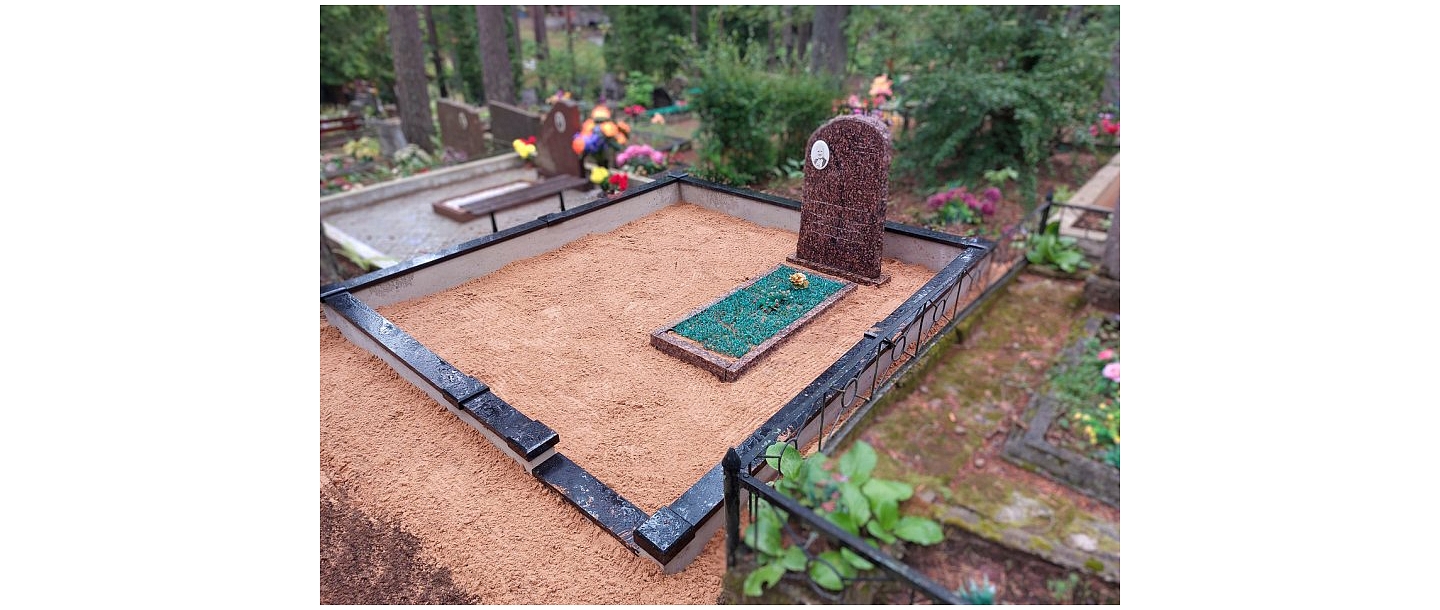 Cemetery with tombstones and gravel borders