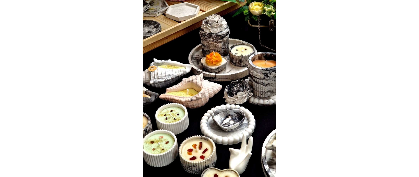 candles in plaster containers