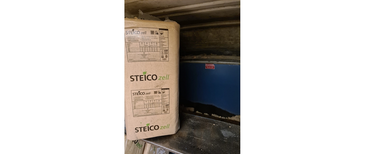 Krendl 2300 thermal insulation installation machine with Steico Zell wood fiber wool