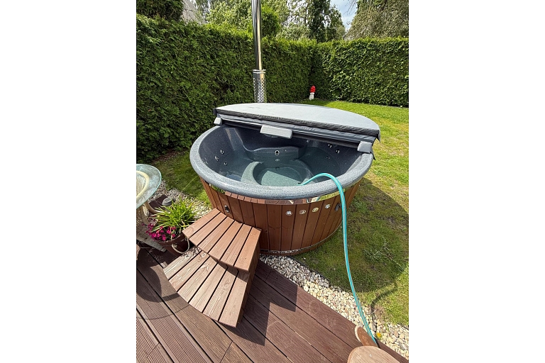 Hot tub with integrated oven and granite top made in Latvia