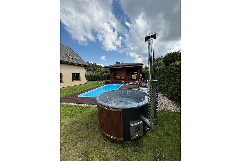 Hot tub with integrated oven and granite top made in Latvia