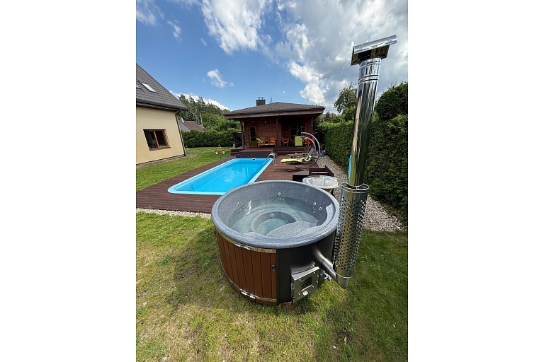 Hot tub with integrated oven and granite top made in Latvia
