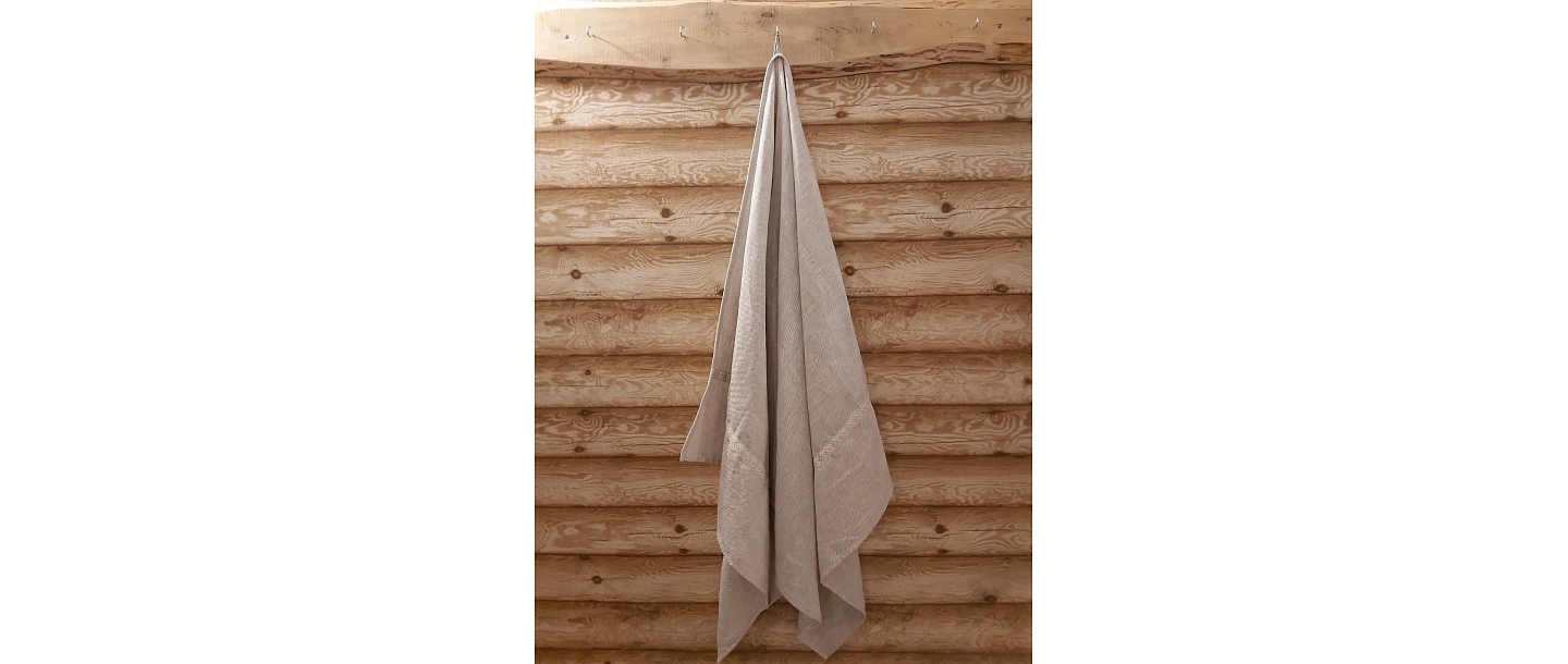 Linen towel with a folk pattern – natural and durable sauna textile