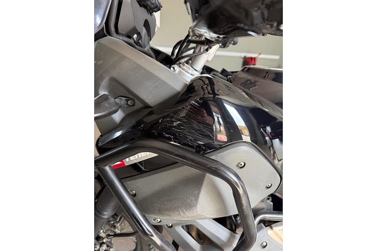 Removing scratches from a motorcycle body