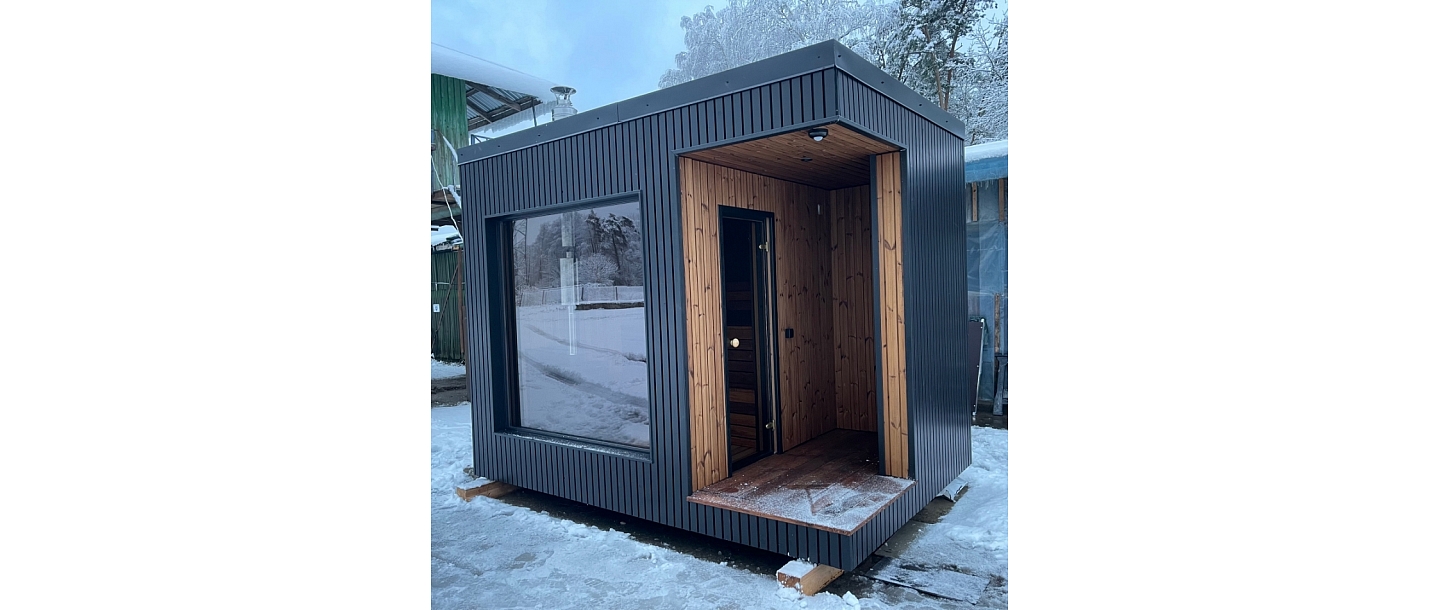 Wooden frame sauna with open anteroom