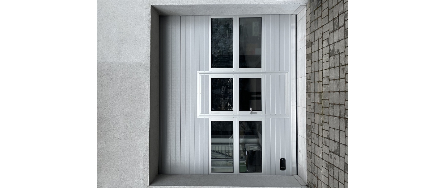 Подъемные ворота для автомастерских