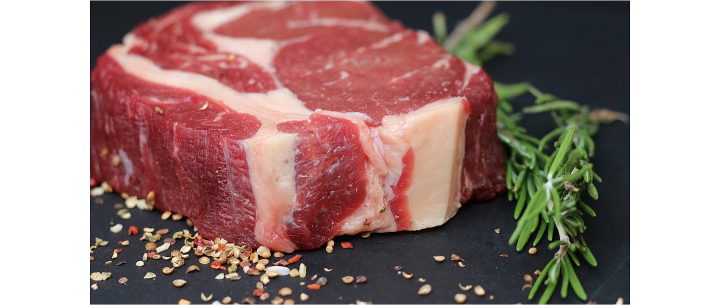 juicy beef steak with natural marbling and spices
