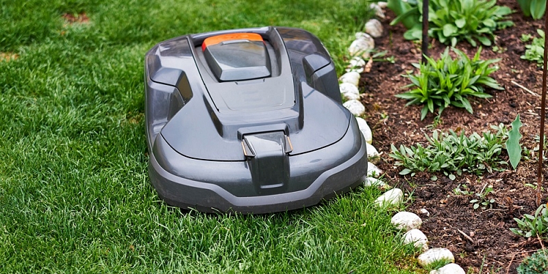 Installing a perimeter wire for robotic lawnmowers