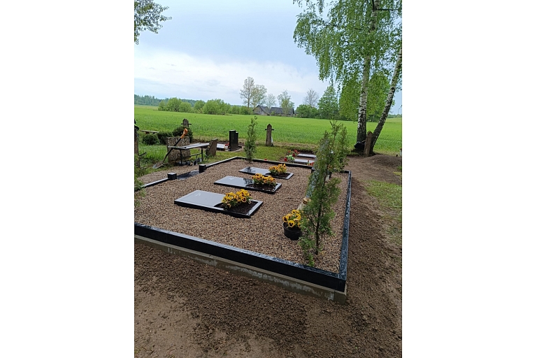 Grave landscaping with granite curbing