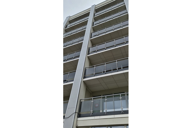 Glass and metal railing systems for modern buildings