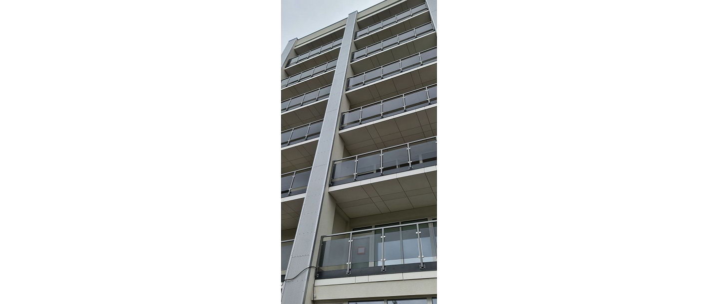 Glass and metal railing systems for modern buildings