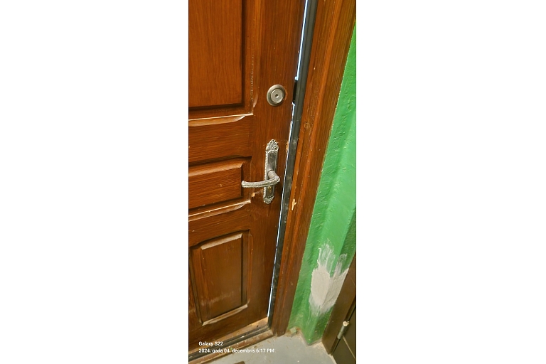 Door adjustment and lock repair.