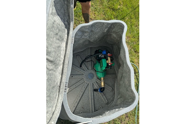 Installing a water pump in a protective box