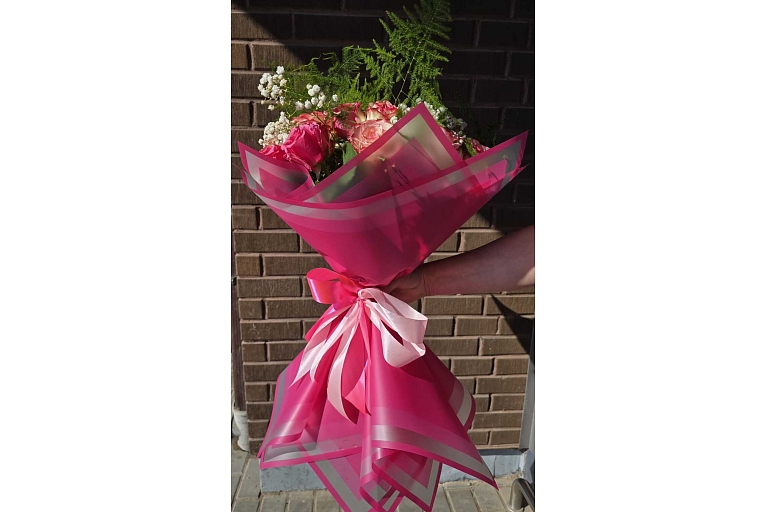 Large bouquet of roses in a package