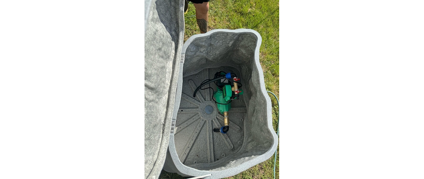 Installing a water pump in a protective box