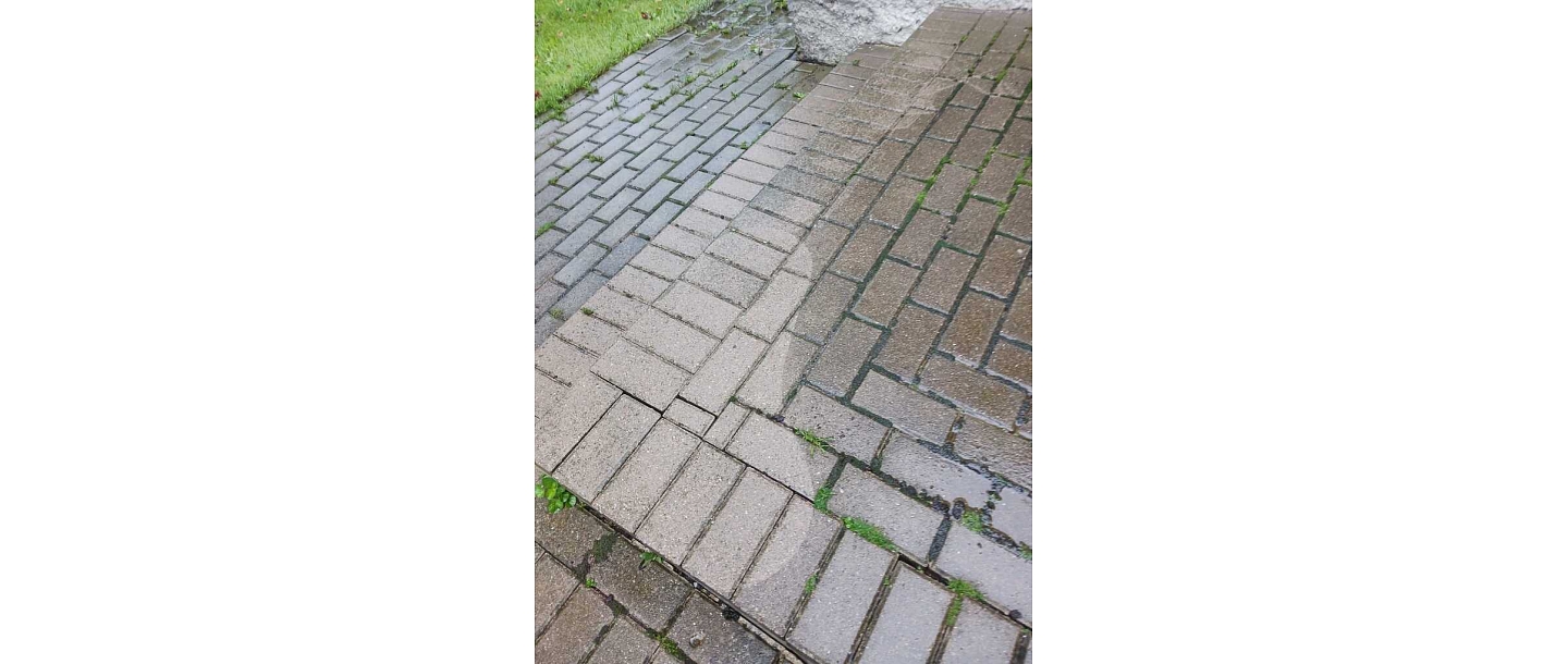 High-pressure washing of pavement